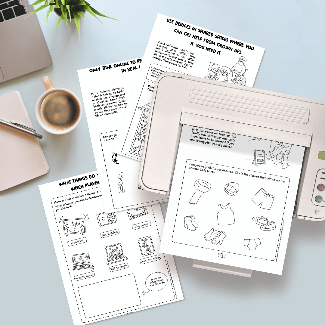 printer with pages from the online safety activity book